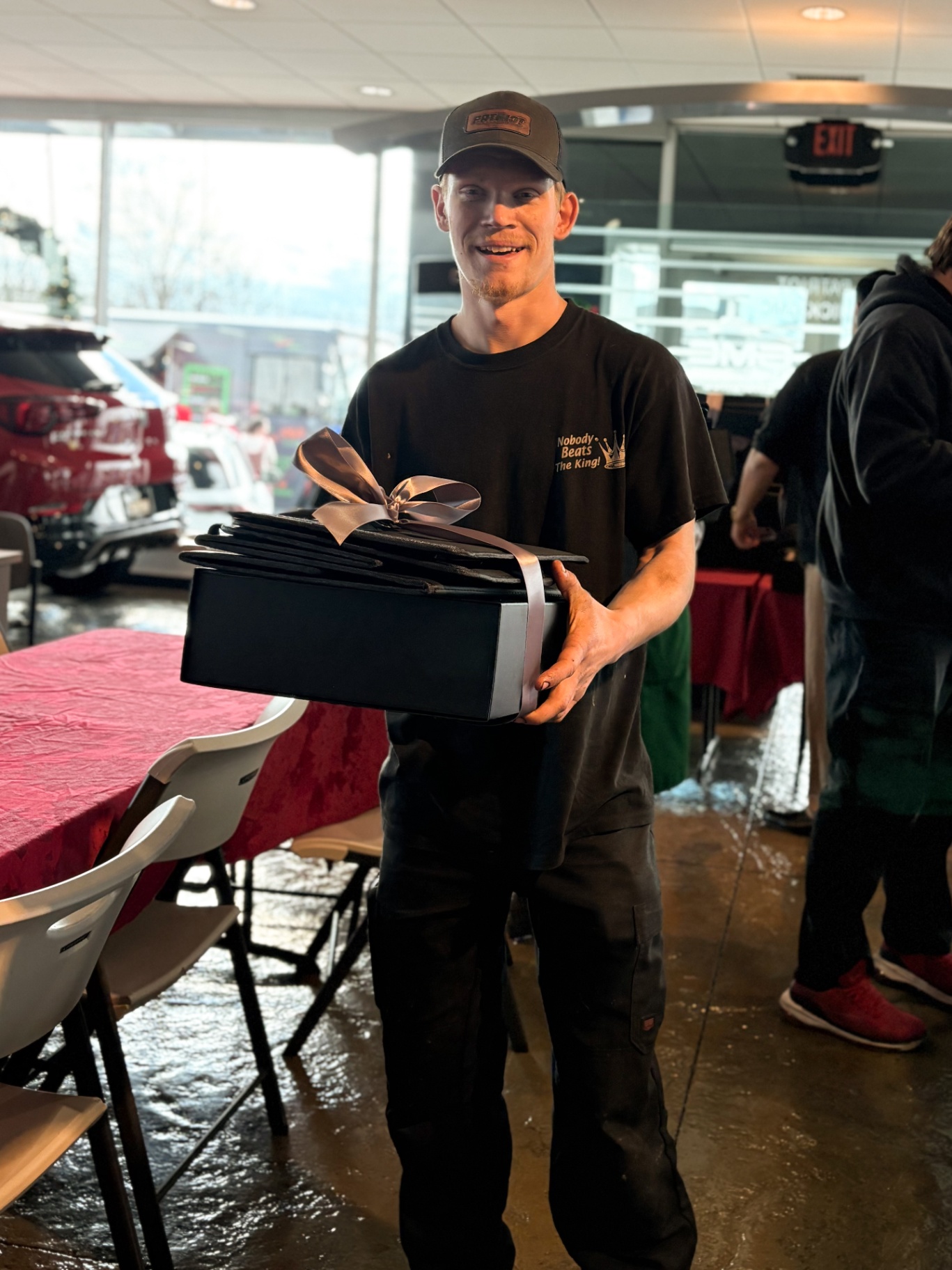 Patriot technician receiving a new toolbox at a team appreciation event